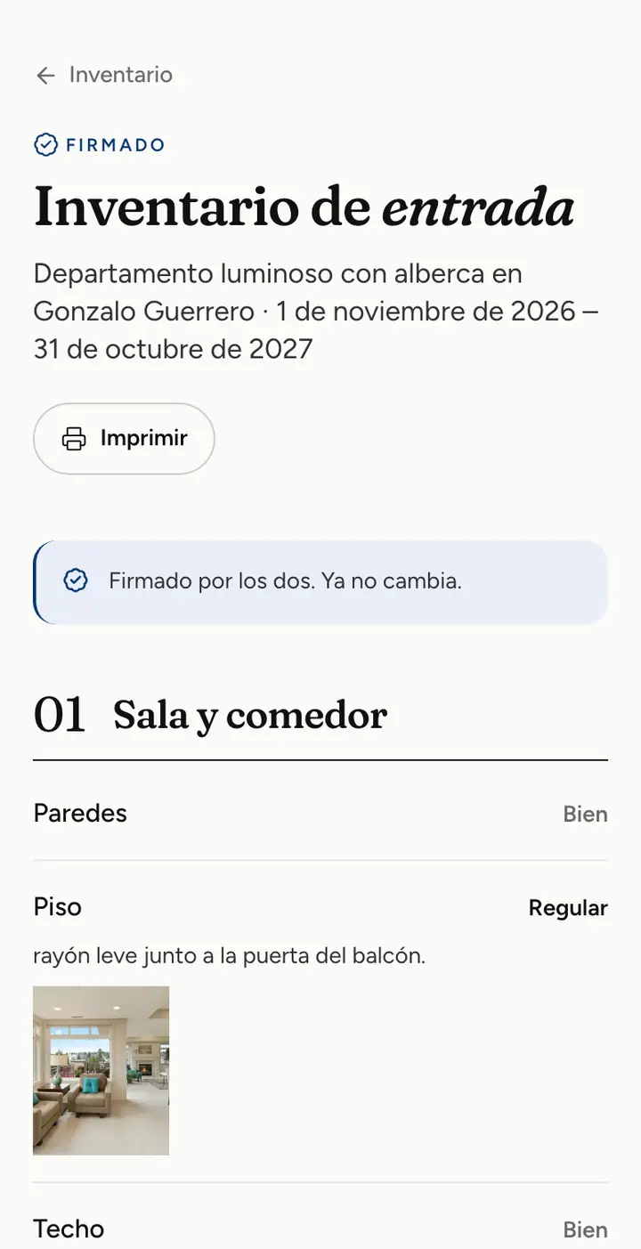 Inventario de entrada firmado por los dos, con la foto de un detalle del piso